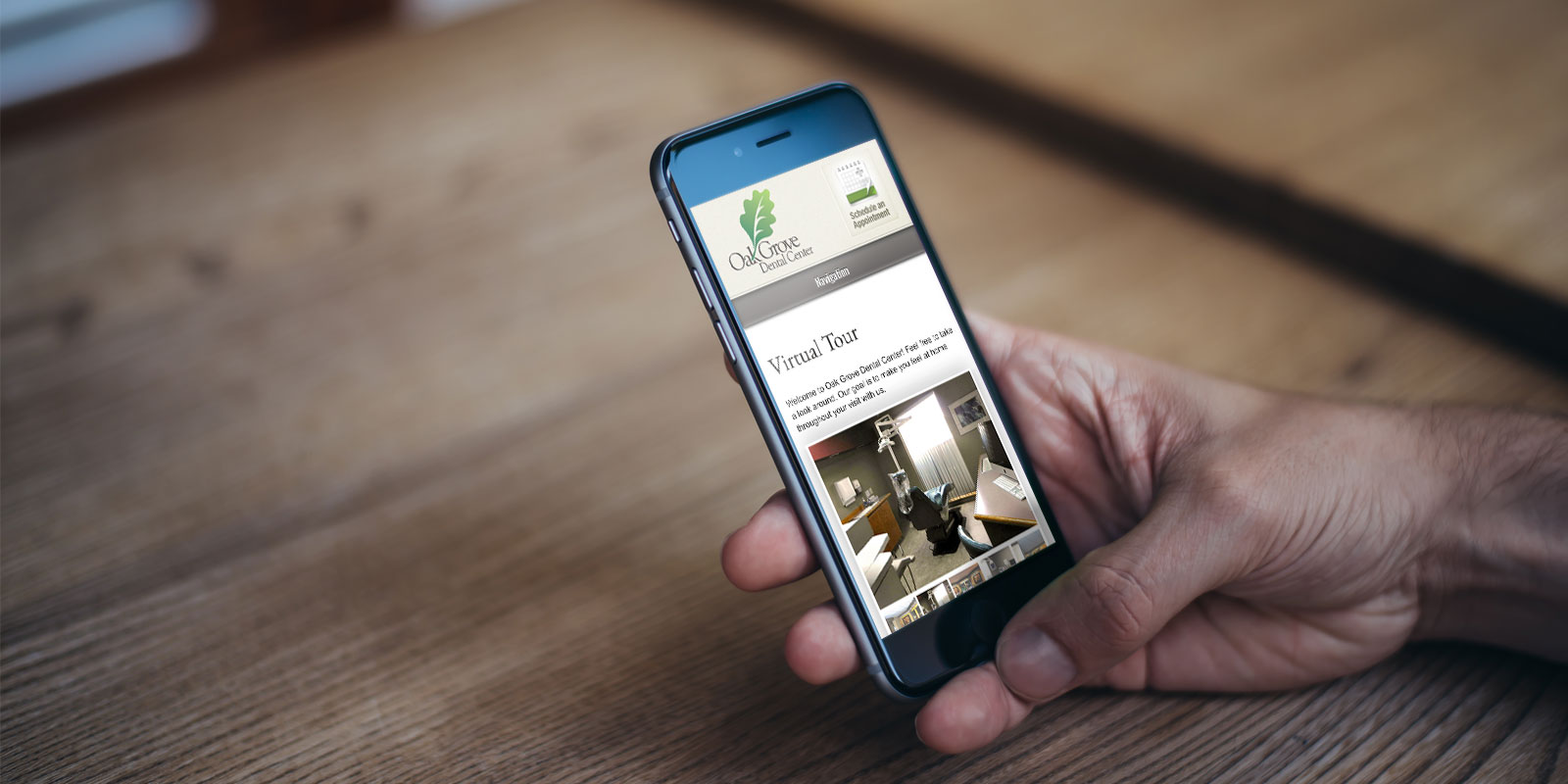 Oak Grove Dental Center website on a smartphone